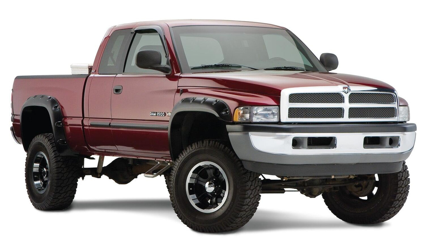 Black Pocket/Rivet Style Smooth Finish 4-Piece Fender Flare Set For 1994-2001 Dodge Ram 1500 1994-2002 Ram 2500, 3500 (Excludes Dually) Fit 78/96 Inch Bed Bushwacker