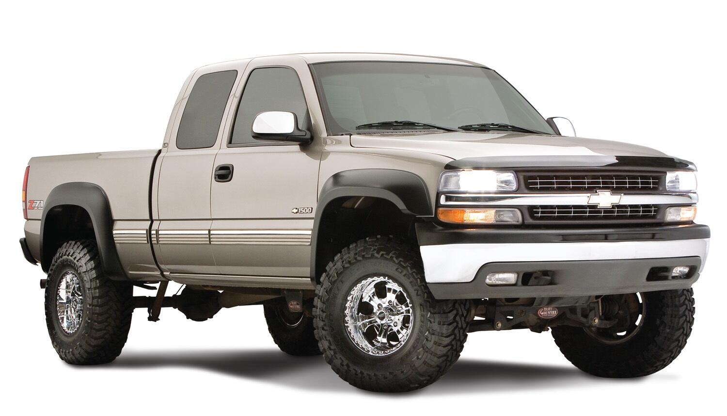 Black Extendafender Style Smooth Finish 4-Piece Fender Flare Set With Extended Coverage For 99-07 Silverado/Sierra Trucks (Check Application Guide) Bushwacker