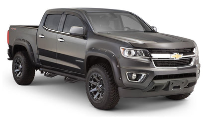 Black Pocket/Rivet Style Smooth Finish 4-Piece Fender Flare Set For 2015-2021 Chevrolet Colorado W/74 Inch Bed Bushwacker
